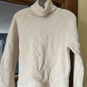 vintage DKNY cream wool turtleneck